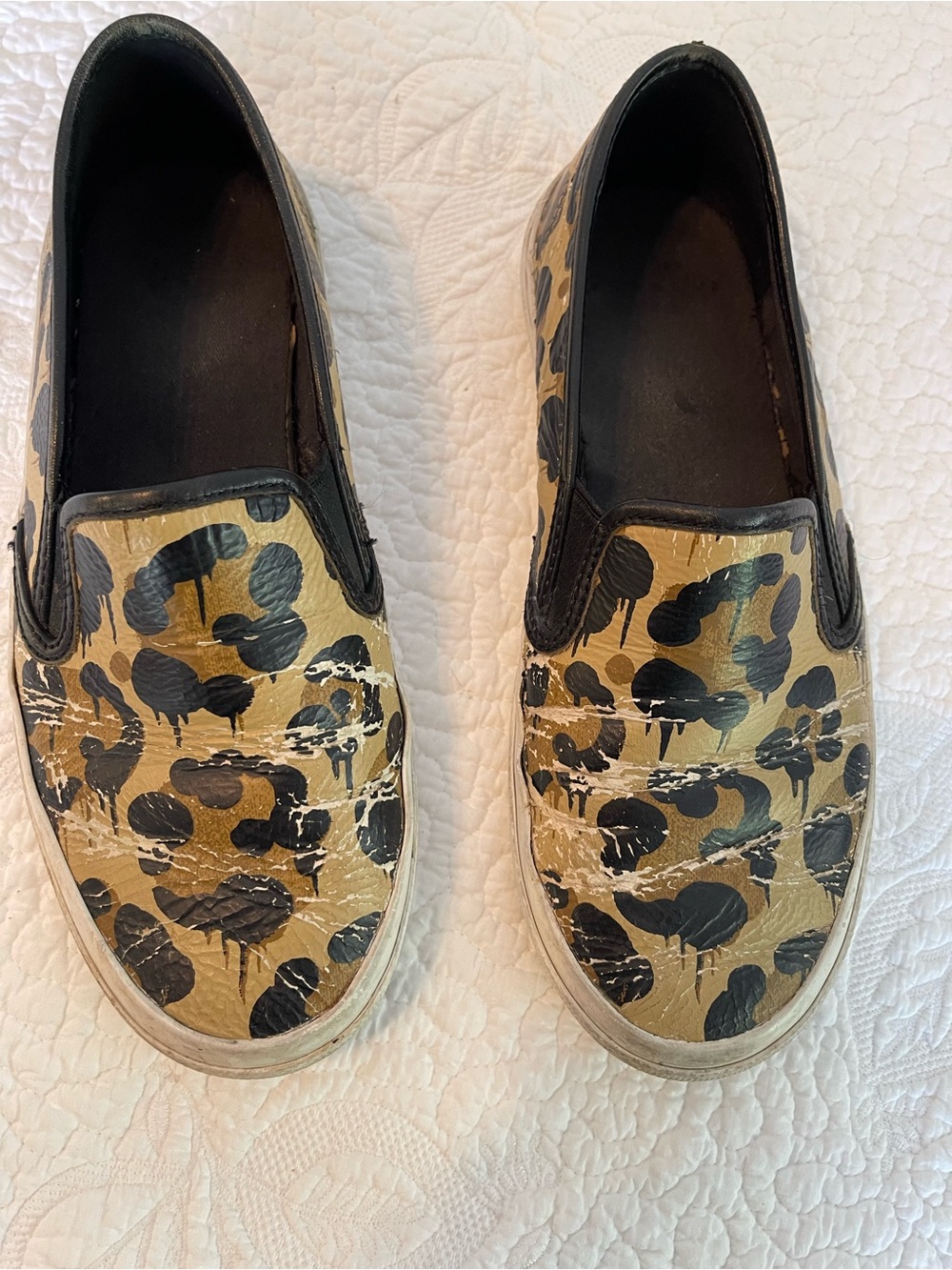 Coach Leather Leopard Print Slip-On Sneakers in Black and Gold